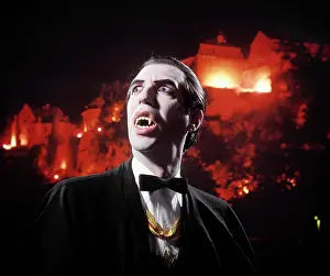 Bloodthirsty: Man in Vampire Makeup and Costume Looking up Menacingly