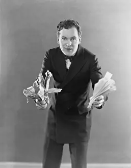 Bragging: Man with wads of money and cash notes
