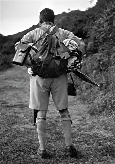 Rambler: Man out walking with backpack