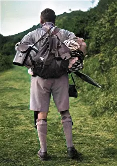 Towels: Man out walking with backpack