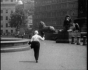 Heatwave: A Man Walking Across Trafalgar Square, London