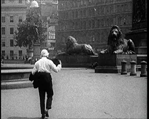 Heatwave: A Man Walking Across Trafalgar Square, London