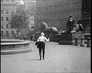 Heatwave: A Man Walking Across Trafalgar Square, London
