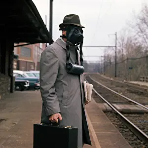Pollute: Man Wearing Gas Mask Hat Train