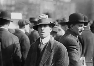 Anarchism: Man wearing a Industrial Workers of the ?