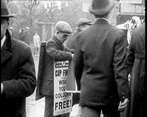 Gazette: A Man Wearing A Sandwich Board Advertising