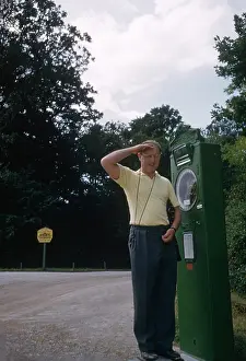 Saluting: Man on a weighing machine, Austria