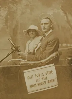 Wert: Man and woman in an automobile