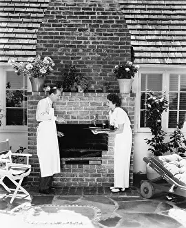 Helpful: Man in woman at their barbecue in the back yard