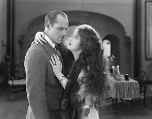Long Haired: Man and woman embracing