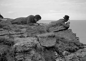 Focusing: Man and woman lying on a rock
