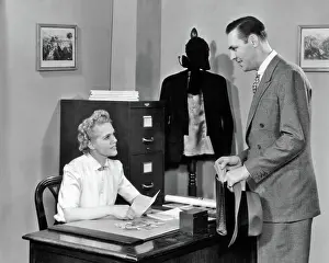 Receptionist: Man and Woman in Office