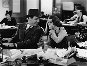 Interactions: Man and woman working in office