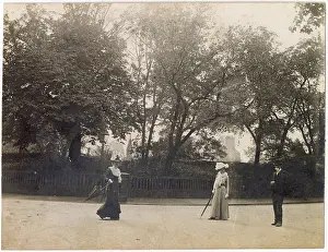 Oxon: Man and two women in the middle of a road