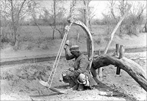 Hammering: Man at work in Kashgar, western China