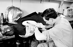 Horseguards: Man at work repairing a saddle