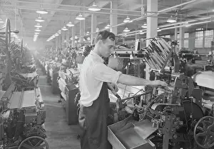 1930 1939: Man working an automatic loom, 1936