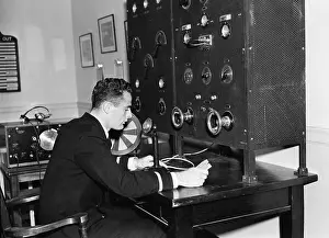 Employ: Man working on a radio