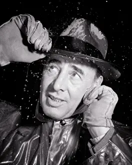 Tugging: Man Worried Expression Caught Outside in Cold