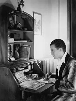 Compositions: Man writing letter at desk