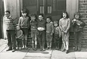 Commentary: Manchester - Group of Children playing in the street