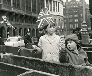 Commentary: Manchester - Two young Children waving Union Flags