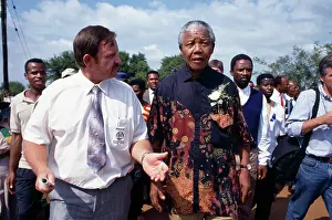 Madiba: Mandela on an election tour, wearing one of his