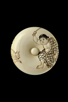 Pigment: Manju netsuke - a boy chasing away two oni, or demons