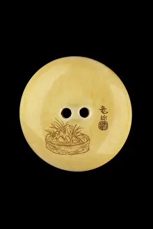 Calligrapher: Manju netsuke - a calligrapher
