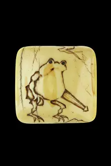 Netsuke: Manju netsuke with a frog holding an umbrella