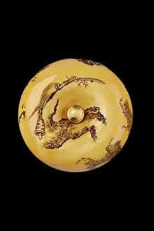 Netsuke: Manju netsuke - Handaka Sonja conjuring up a dragon