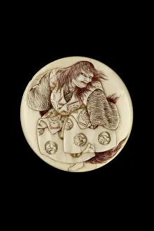 Kosai: Manju netsuke - the lion dance from the No play Shakkyo