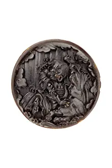 Casein: Manju netsuke - Mongaku beneath a waterfall
