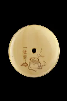 Netsuke: Manju netsuke - an ox-herd trying to mount his ox