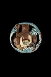 Overglaze: Manju netsuke, Raijin the Thunder God peering through clouds