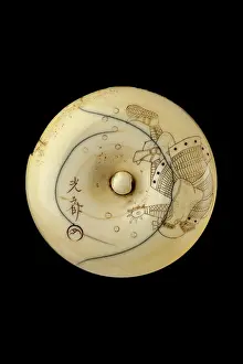 1187: Manju netsuke - Tadanobu defending himself with a go board