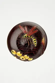 Manju: Manju netsuke with wasp and berries