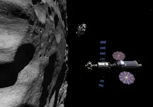 Stay: A Manned Maneuvering Vehicle descends toward the surface of