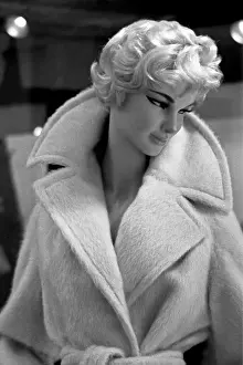 Displaying: Mannequin modelling coat in window display, London