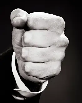 Man S: Man?s Fist Coming Towards the Camera Ready For