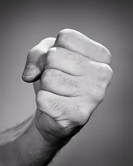 Man S: Man?s Fist Coming Towards the Camera Ready For