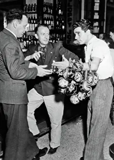 Maracas: Maracas Vendor Approaching to Two Men at the Bar at Slo
