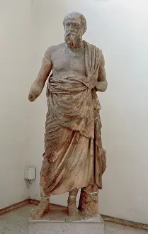 Delphi: Marble statue of a greek philosopher. Probably Socrates