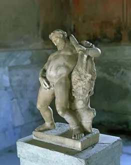 Urinating: Marble statue of Hercules urinating