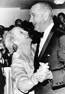 Inaugurations: Margaret Truman Daniel dances with President Johnson