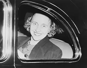 Hcdarna: Margaret Truman, looking out the window of an