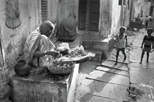 Ganges: Marigold seller, India