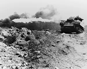 Throwers: Marine flame-throwing tank and Marine snipers
