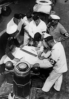 Compass: Marine SA members study maps, 1937