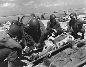 Tarawa: Marine on the stretcher at a dressing station